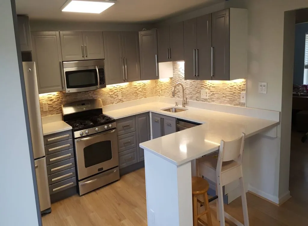 Quartz countertops and gray cabinets