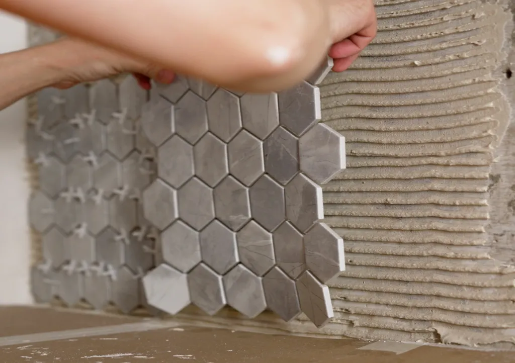 Laying tile for kitchen backsplash