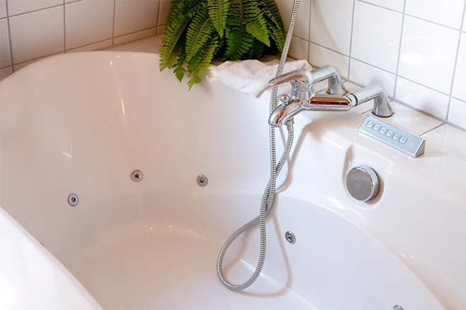 Bathtub with massaging jets