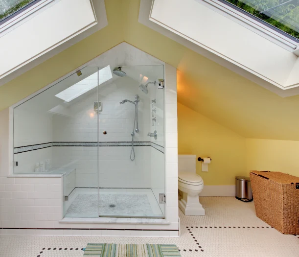 Upstairs shower with two sky lights