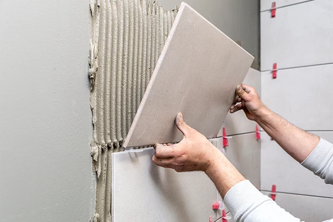 Installing shower wall tiles