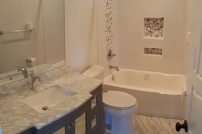 New bathroom with bathtub and shower